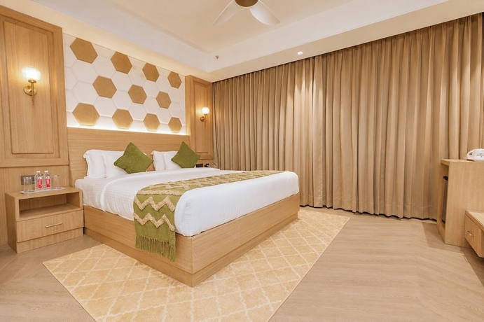 Imagen de la habitación del Hotel White Wharf Manesar. Foto 8