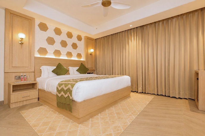 Imagen de la habitación del Hotel White Wharf Manesar. Foto 9