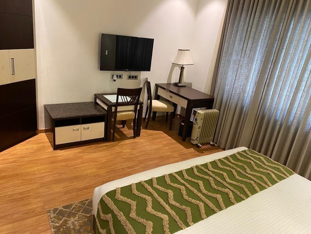 Imagen de la habitación del Hotel White Wharf Manesar. Foto 10
