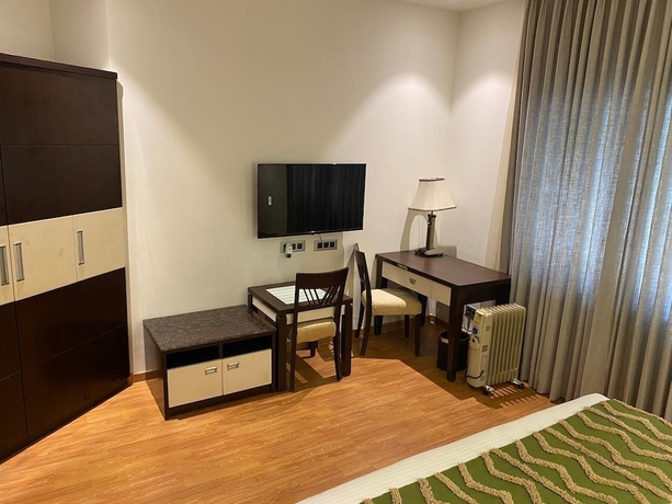Imagen de la habitación del Hotel White Wharf Manesar. Foto 11
