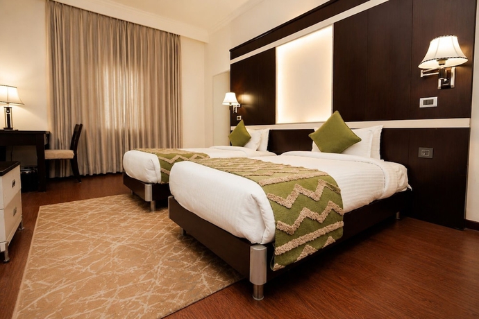 Imagen de la habitación del Hotel White Wharf Manesar. Foto 12