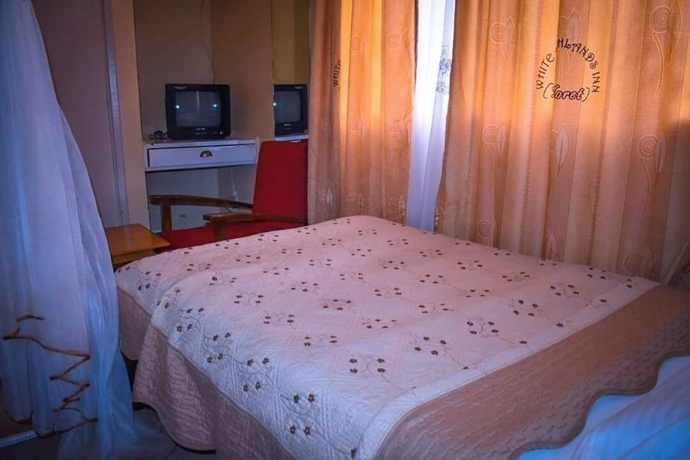 Imagen de la habitación del Hotel White highlands Inn Eldoret. Foto 8