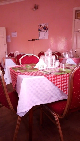 Imagen del bar/restaurante del Hotel White highlands Inn Eldoret. Foto 5