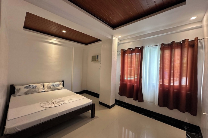 Imagen de la habitación del Hotel White-Beach Hideaway Resort Puerto Galera. Foto 3