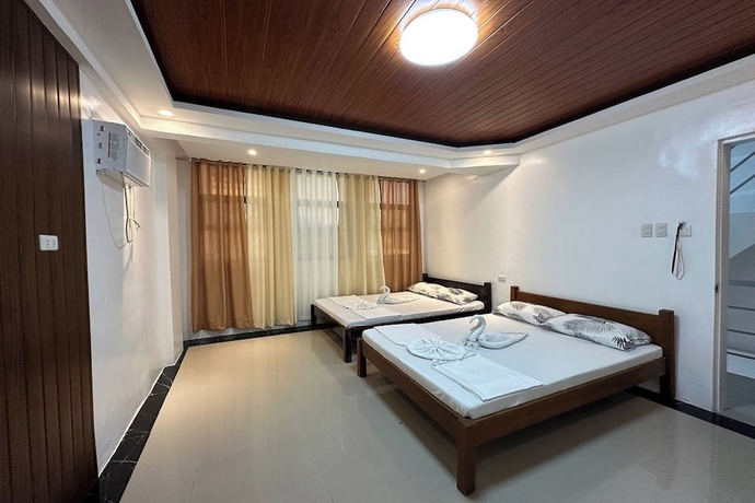 Imagen de la habitación del Hotel White-Beach Hideaway Resort Puerto Galera. Foto 5