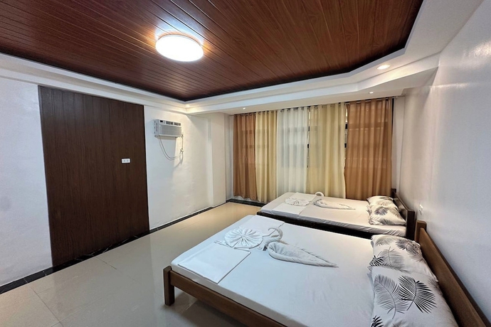 Imagen de la habitación del Hotel White-Beach Hideaway Resort Puerto Galera. Foto 6