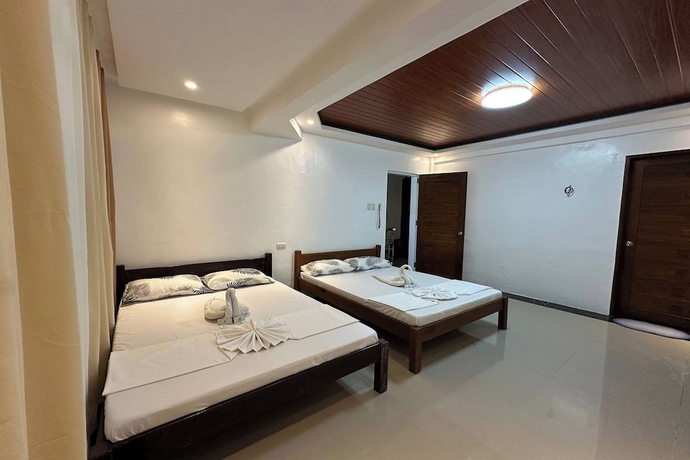 Imagen de la habitación del Hotel White-Beach Hideaway Resort Puerto Galera. Foto 9