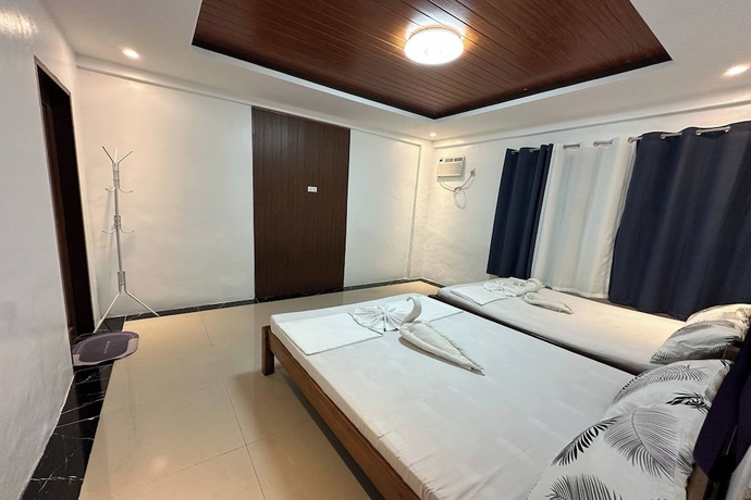 Imagen de la habitación del Hotel White-Beach Hideaway Resort Puerto Galera. Foto 12