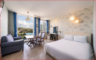 Imagen de la habitación del Hotel Whitehouse. Foto 4