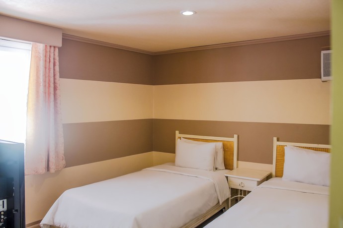 Imagen de la habitación del Hotel Whiterock Beach Resort. Foto 7