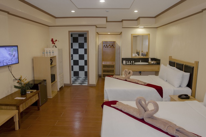 Imagen de la habitación del Hotel Whiterock Beach Resort. Foto 14