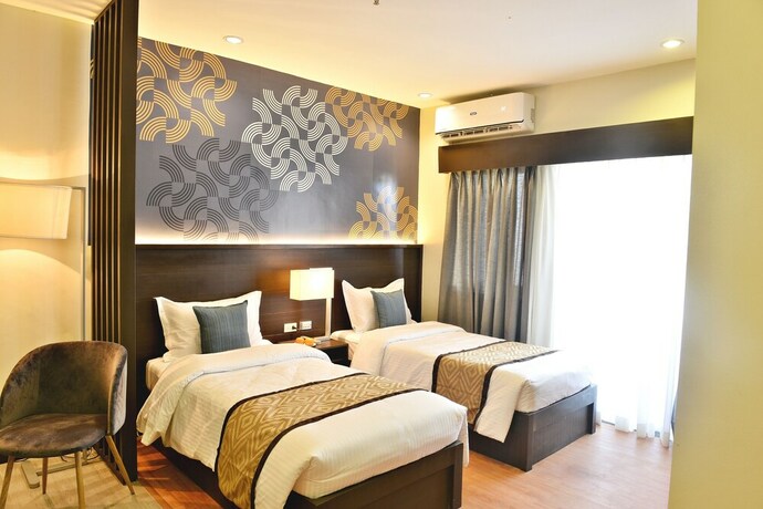 Imagen de la habitación del Hotel Whitewoods Convention and Leisure. Foto 15