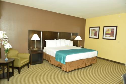 Imagen de la habitación del Hotel Whitney Inn and Suites. Foto 3