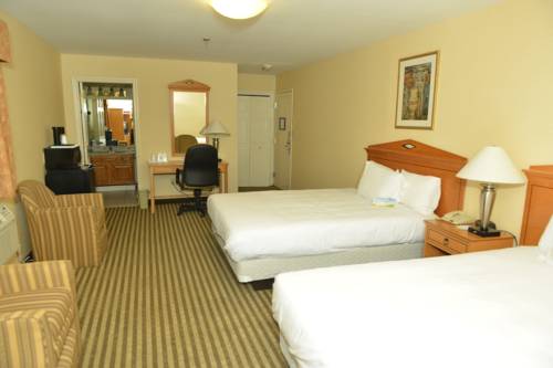 Imagen de la habitación del Hotel Whitney Inn and Suites. Foto 5