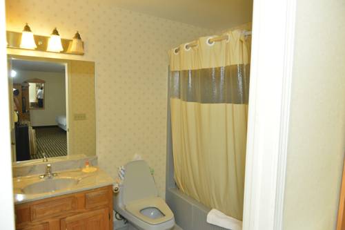 Imagen de la habitación del Hotel Whitney Inn and Suites. Foto 6