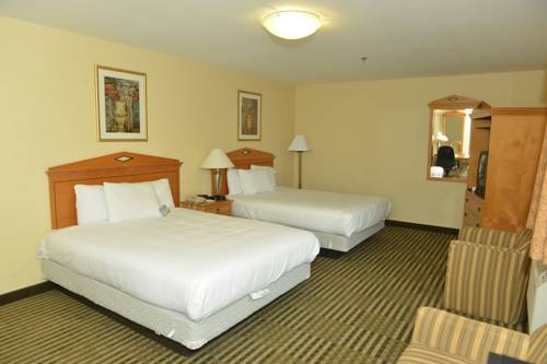 Imagen de la habitación del Hotel Whitney Inn and Suites. Foto 7