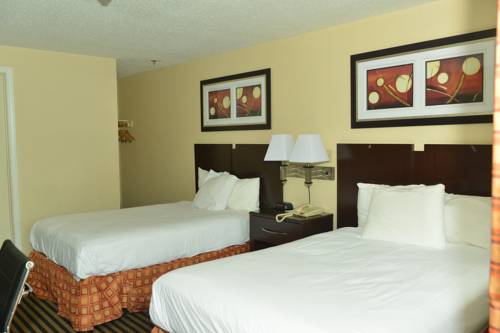 Imagen de la habitación del Hotel Whitney Inn and Suites. Foto 8
