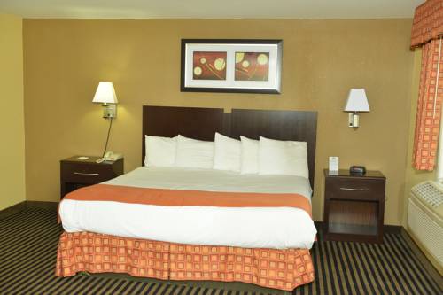 Imagen de la habitación del Hotel Whitney Inn and Suites. Foto 11