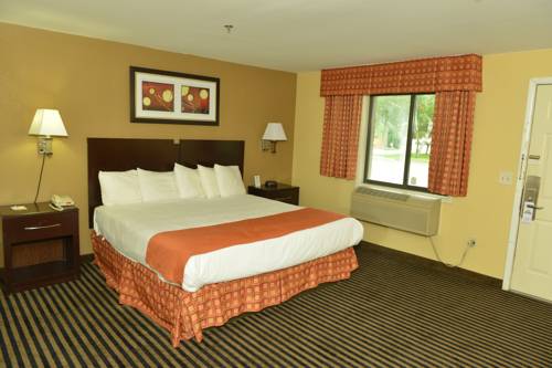 Imagen de la habitación del Hotel Whitney Inn and Suites. Foto 13