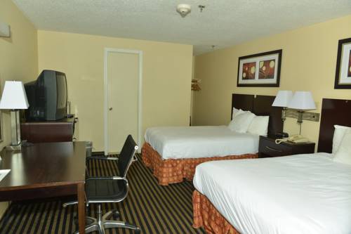 Imagen de la habitación del Hotel Whitney Inn and Suites. Foto 14
