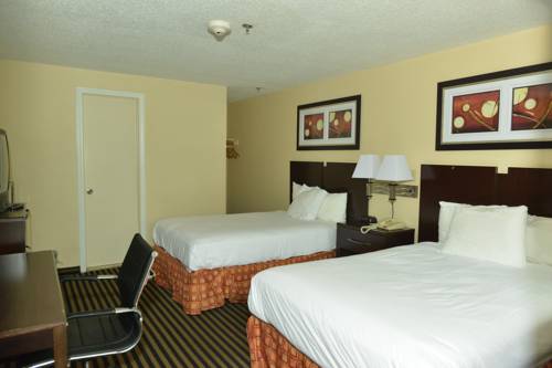 Imagen de la habitación del Hotel Whitney Inn and Suites. Foto 15