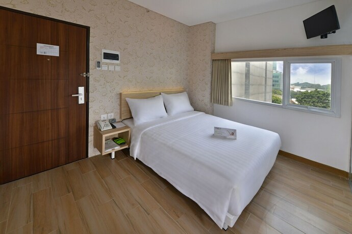 Imagen de la habitación del Hotel Whiz Falatehan Jakarta - Chse Certified. Foto 11