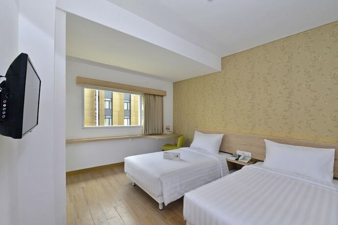 Imagen de la habitación del Hotel Whiz Falatehan Jakarta - Chse Certified. Foto 12