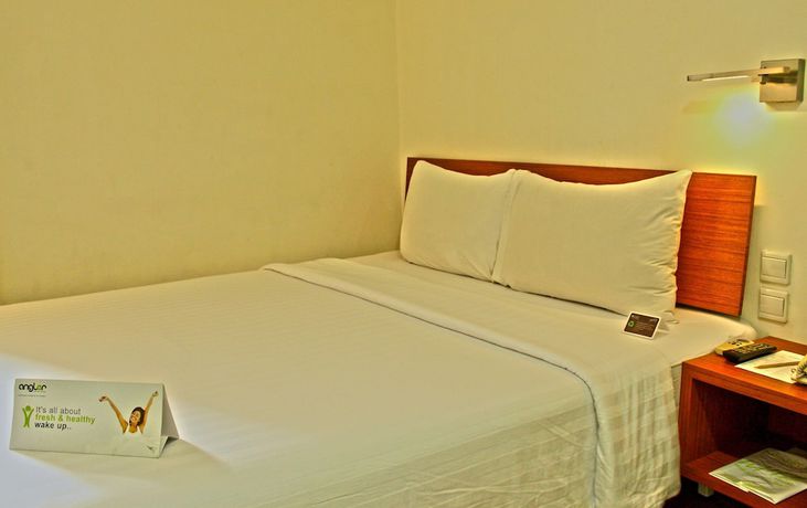 Imagen de la habitación del Hotel Whiz Malioboro Yogyakarta. Foto 11