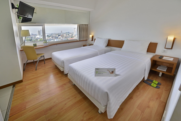 Imagen de la habitación del Hotel Whiz Pemuda Semarang. Foto 8