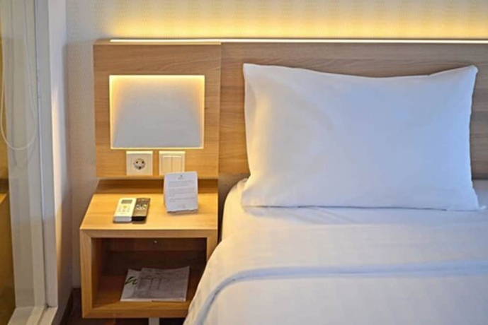 Imagen de la habitación del Hotel Whiz Prime Basuki Rahmat Malang. Foto 15