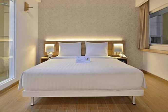 Imagen de la habitación del Hotel Whiz Prime Basuki Rahmat Malang. Foto 17