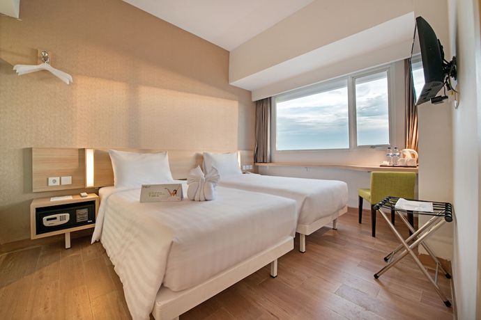 Imagen de la habitación del Hotel Whiz Prime Hasanuddin Makassar - Chse Certified. Foto 7
