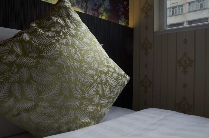 Imagen de la habitación del Hotel Whole Sunshine International. Foto 2