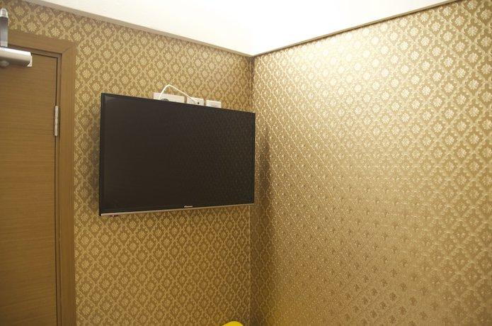 Imagen de la habitación del Hotel Whole Sunshine International. Foto 3