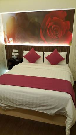 Imagen de la habitación del Hotel Whole Sunshine International. Foto 7