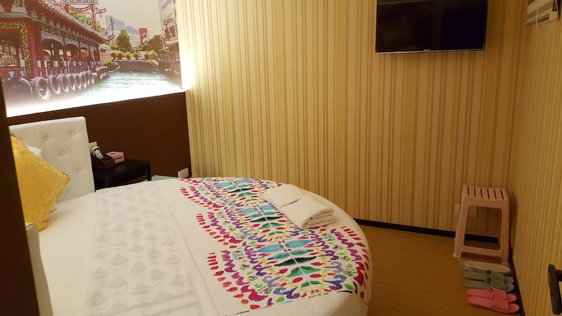 Imagen de la habitación del Hotel Whole Sunshine International. Foto 12
