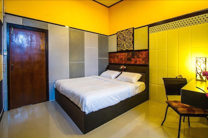 Imagen de la habitación del Hotel Wiang Kum Kam Resort. Foto 5