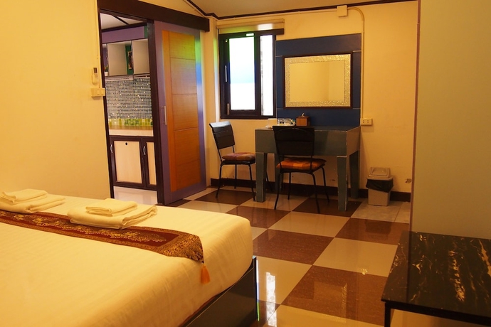 Imagen de la habitación del Hotel Wiang Kum Kam Resort. Foto 10