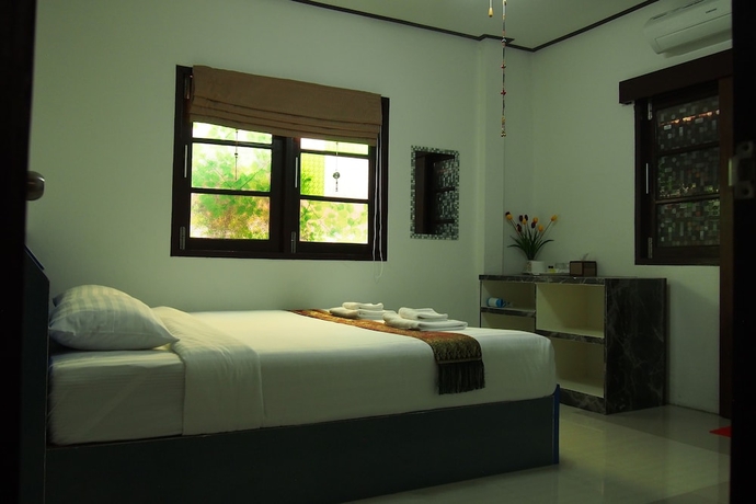 Imagen de la habitación del Hotel Wiang Kum Kam Resort. Foto 11