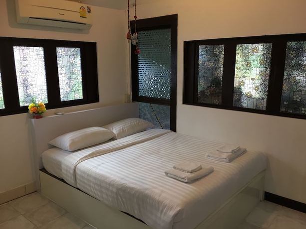 Imagen de la habitación del Hotel Wiang Kum Kam Resort. Foto 14