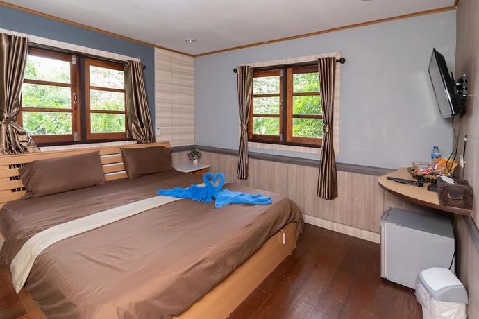 Imagen de la habitación del Hotel Wiangkham Resort. Foto 7