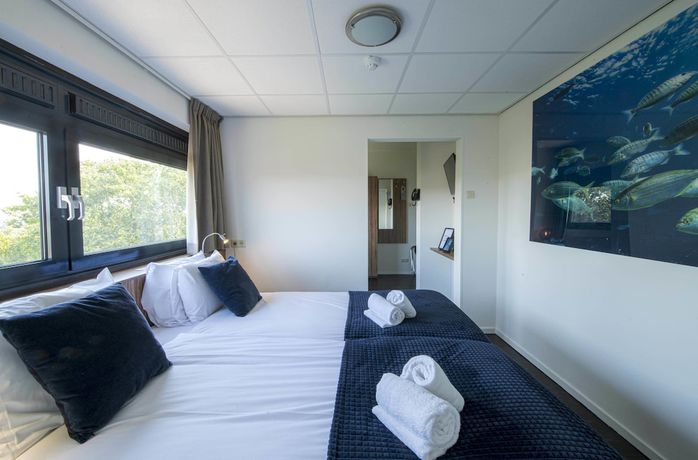 Imagen de la habitación del Hotel Wicc. Foto 7