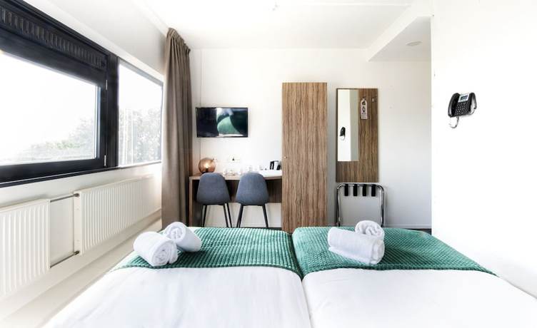 Imagen de la habitación del Hotel Wicc. Foto 10