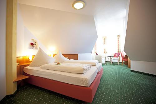 Imagen de la habitación del Hotel Widmann\'s Löwen. Foto 9