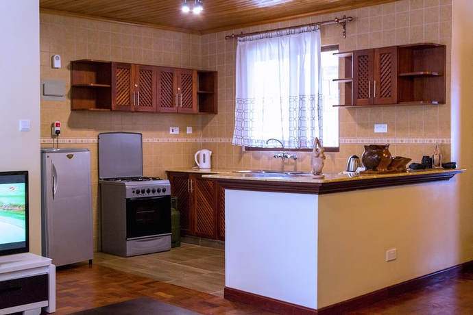 Imagen de la habitación del Hotel Wigot Gardens. Foto 10