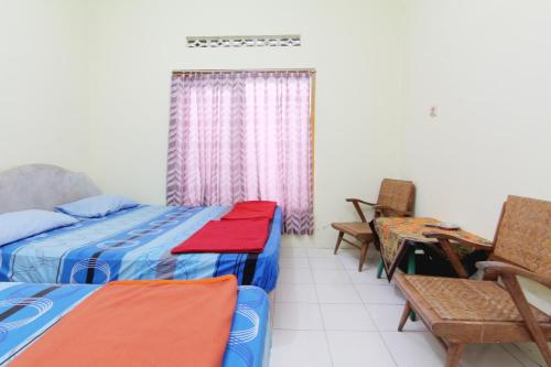 Imagen de la habitación del Hotel Wijaya 2 Kaliurang. Foto 13
