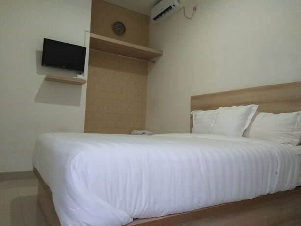 Imagen de la habitación del Hotel Wika Bali Beach House. Foto 20