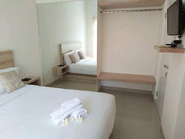 Imagen de la habitación del Hotel Wika Bali Beach House. Foto 26