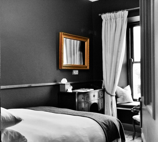 Imagen de la habitación del Hotel Wild Honey Inn. Foto 6