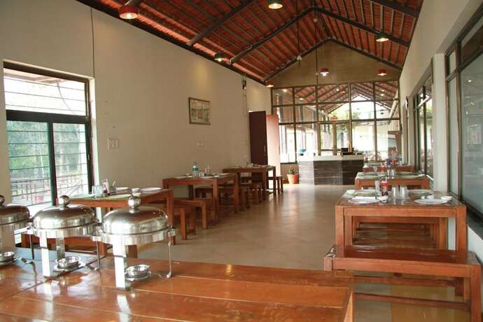 Imagen del bar/restaurante del Hotel Wild Mark Resort Kanha. Foto 17